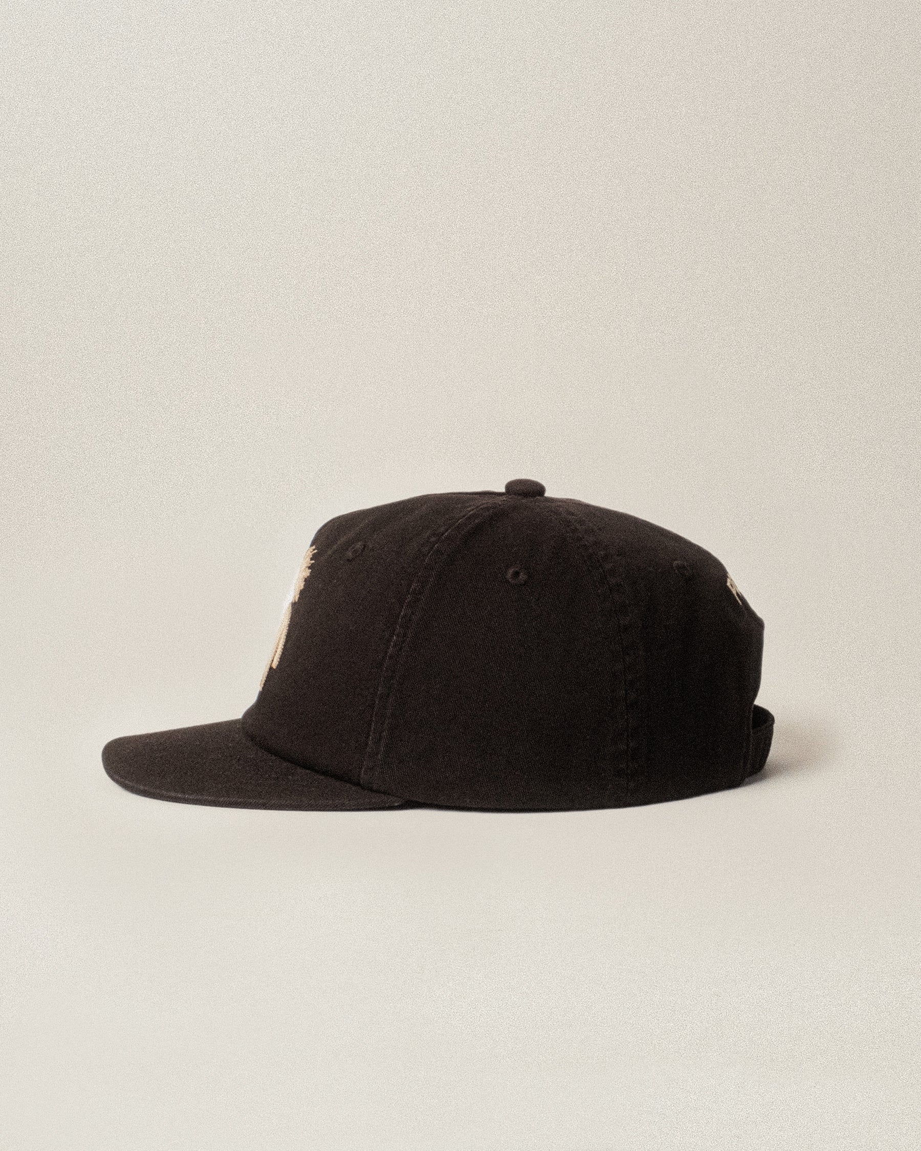 Black Akela 5 Panel Cap | Caps, Hats & Beanies ‐ P&Co - A Mindset